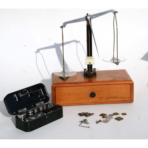 305 - A set of W A Webb Ltd Class B Opium / Scientific scales, mounted on a mahogany box base with single ... 