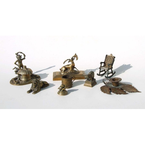 319 - A late Victorian brass pen and ink stand entitled 'Dartmoor Pixie', 12cms wide; together with a bron... 