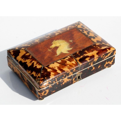 333 - A George III tortoiseshell box with silver wirework and ivory stringing, on bun feet, 17cms wide.Con... 