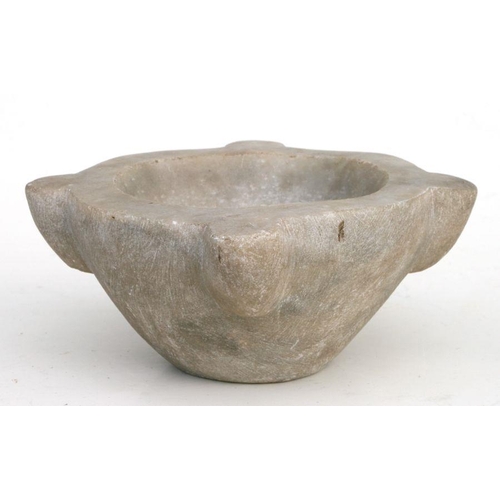 335 - An antique marble mortar, 21cms diameter.