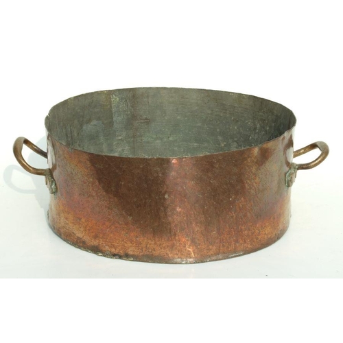 353 - A large copper cooking pot with brass handles 41cms (16.125ins) diameter by 17cms (6.75ins) high, im... 