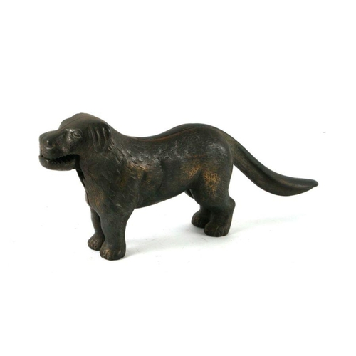 357 - A pair of cast mechanical nutcrackers in the form of a standing dog, 30cms long.