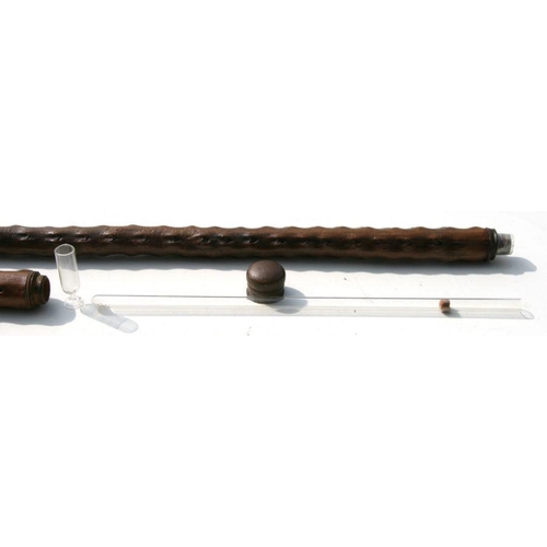 386 - A briar wood walking stick, the metal cap unscrewing to reveal a stemmed cup, the stick enclosing a ... 