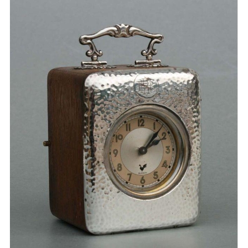 415 - A silver mounted oak cased carriage time piece, Birmingham 1905, 11cms high.