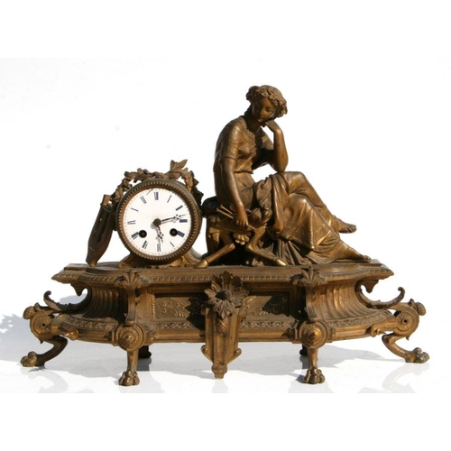 416 - A 19th century French gilt metal figural mantle clock, 50cms wide.