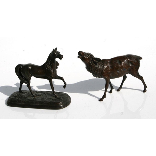 451 - A silver plated twin inkwell desk stand, 21cms wide; together with a bronzed spelter figure of a hor... 