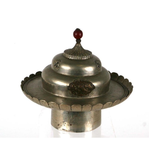 549 - A Eastern silver coloured metal incense burner and cover, 12cms diameter.