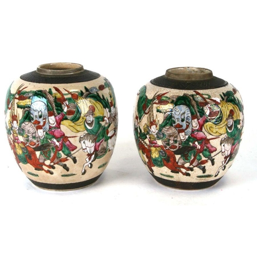 550 - Two Chinese famille rose ginger jars decorated with warriors, one with an incised four-character mar... 