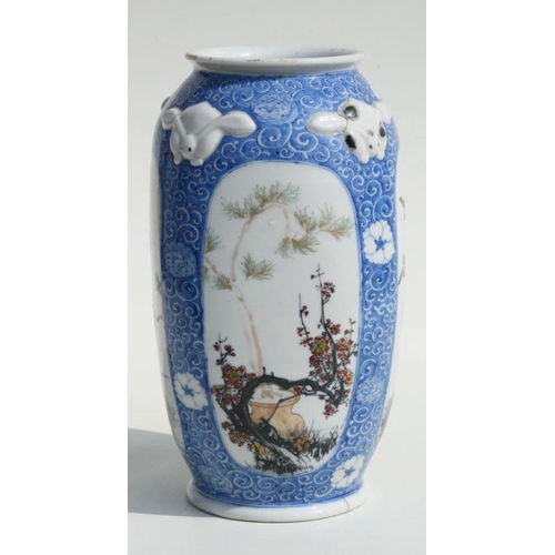 553 - A late 19th century Japanese vase decorated with flowers, trees and birds within panels, six charact... 