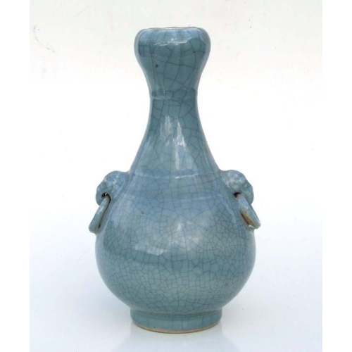 581 - A Chinese crackleware two-handled vase of baluster form, 31cms high.