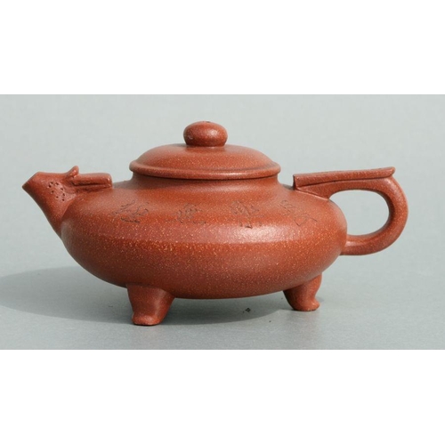 582 - A Chinese Yixing potter teapot with incised bamboo decoration and calligraphy, four character seal m... 