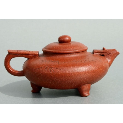 582 - A Chinese Yixing potter teapot with incised bamboo decoration and calligraphy, four character seal m... 