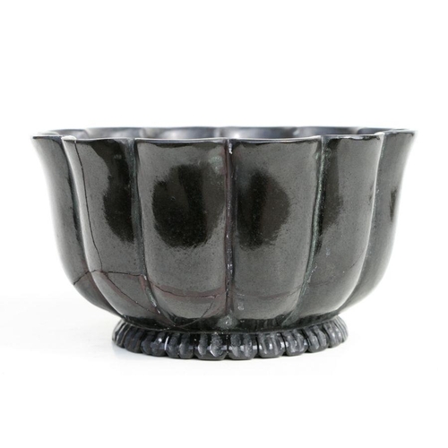 605 - An Asian hardstone bowl of lobed form, 14.5cms diameter.Condition ReportExtensively restored.... 