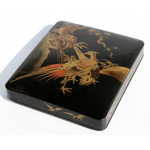 613 - A Japanese Meiji period black lacquer and chinoiserie decorated writing box, the cover decorated wit... 