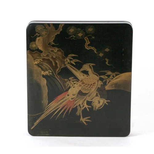 613 - A Japanese Meiji period black lacquer and chinoiserie decorated writing box, the cover decorated wit... 