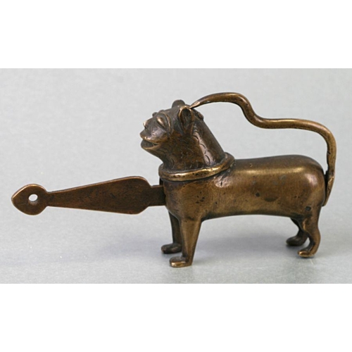 626 - An Islamic / Moghul bronze lock in the form of a stylised lion, possibly 17th / 18th century, 18cms ... 