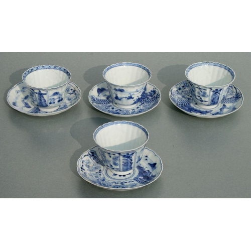 630 - A set of four Chinese blue & white tea bowls and saucers decorated with flowers and landscape sc... 