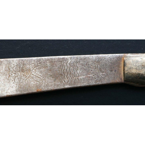 65 - An Indonesian Parang / machete with horn handle, the blade engraved with stylised fish, 51cms long.