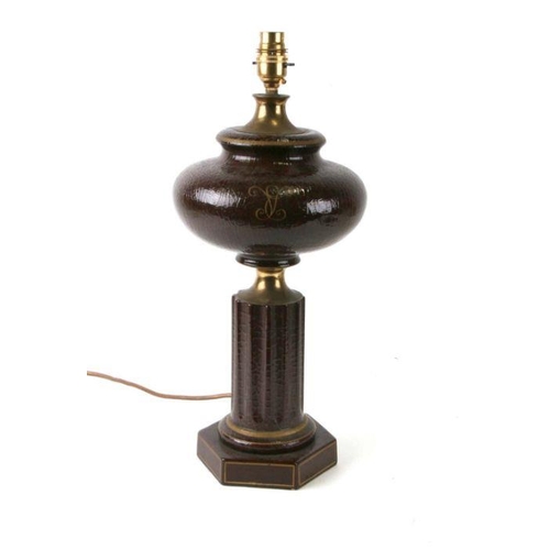 650 - A brown crackle glaze oil lamp base with gilt monogram, converted for electricity, 45cms high.