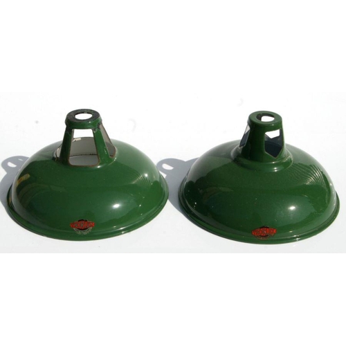 657 - A pair of mid century Thorlux green enamel pendant shades, 28cms diameter (2).