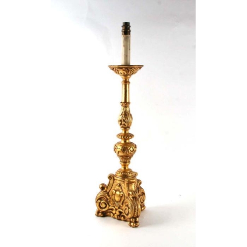 658 - A large gilt plaster table lamp, 65cms high.