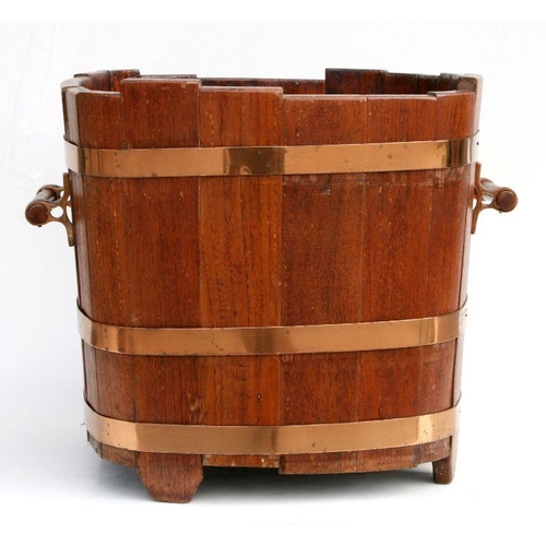 665 - A copper coopered two-handled log bin, 45cms wide.