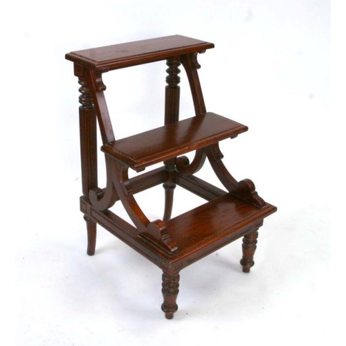 666 - A set of George III style mahogany library steps with reeded columns and turned front legs, 52cms wi... 