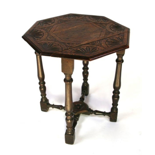 691 - An oak joint stool, 48cms wide; together with an oak octagonal occasional table with carved top, 56c... 