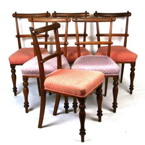 696 - A set of six Victorian dining chairs with upholstered seats and turned front supports (6).