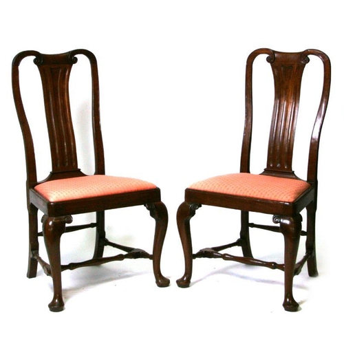 697 - A pair of 18th century style mahogany chairs with upholstered drop-in seats, on cabriole legs and pa... 