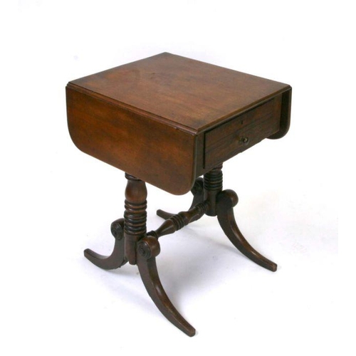 702 - An early 19th century mahogany drop-flap work table with single frieze drawer opposing two faux draw... 