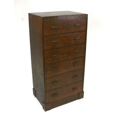 709 - An early 20th century Hypnos oak bank of six drawers, 54cms wide.