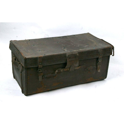 711 - A vintage leather brass studded travel trunk, 79cms wide.