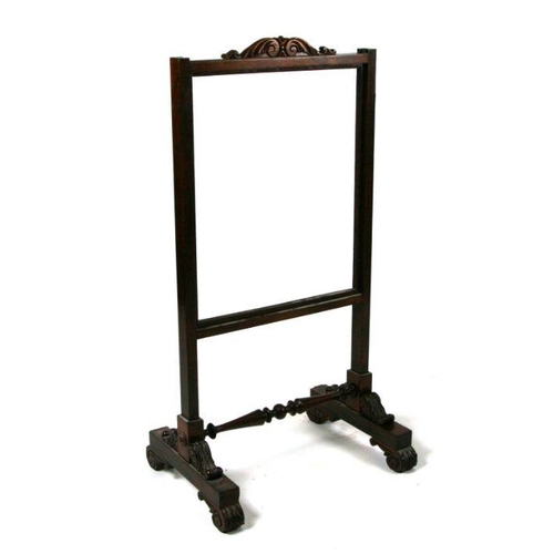 717 - A William IV rosewood fire screen frame, 51cms wide.