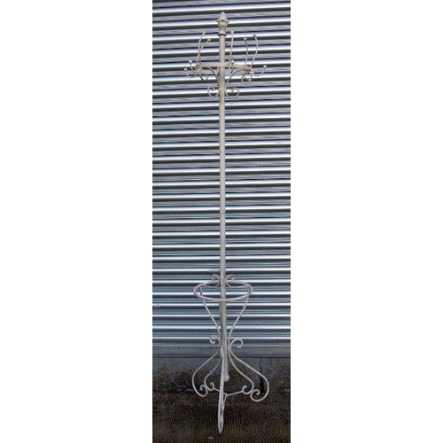 718 - A painted metal coat and hat stand.