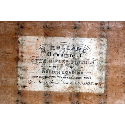 86 - An H Holland, New Bond Street London, leather cartridge magazine (a/f), 36cms wide.