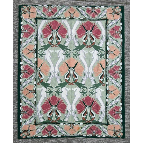 90 - An Art Nouveau style Crewel work wall hanging decorated with stylised flowers, 120 by 182cms.