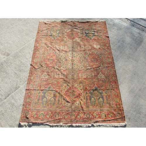 91 - A Turkish carpet with central floral medallion on a red ground, 202 by 286cms.