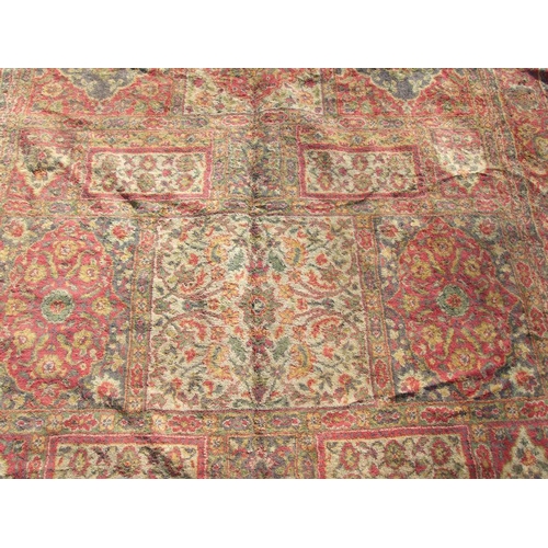 91 - A Turkish carpet with central floral medallion on a red ground, 202 by 286cms.