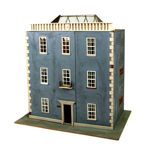 70 - A vintage dolls house 'The Manse' together with a large quantity of dolls house furniture and access... 