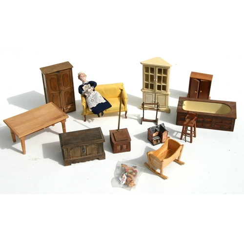 70 - A vintage dolls house 'The Manse' together with a large quantity of dolls house furniture and access... 