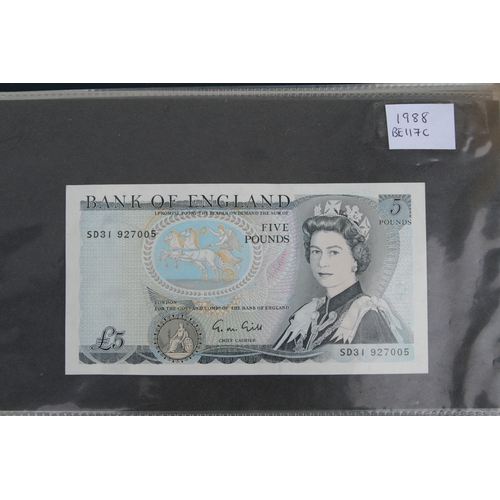 429 - An album containing English banknotes to include 10 shilling note, £1 notes and £5 notes, some in un... 