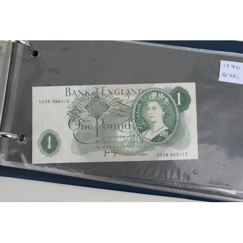 429 - An album containing English banknotes to include 10 shilling note, £1 notes and £5 notes, some in un... 