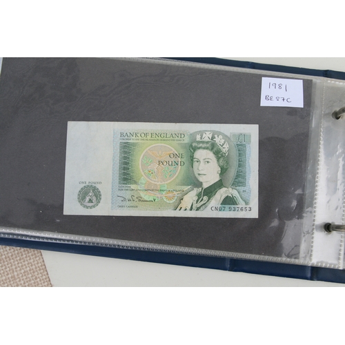 429 - An album containing English banknotes to include 10 shilling note, £1 notes and £5 notes, some in un... 