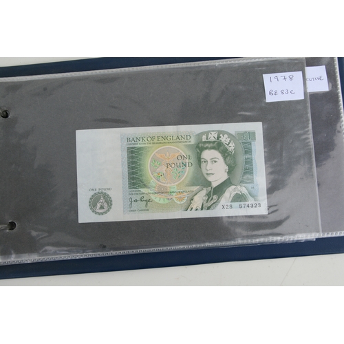 429 - An album containing English banknotes to include 10 shilling note, £1 notes and £5 notes, some in un... 