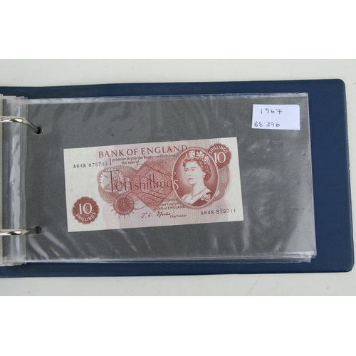 429 - An album containing English banknotes to include 10 shilling note, £1 notes and £5 notes, some in un... 