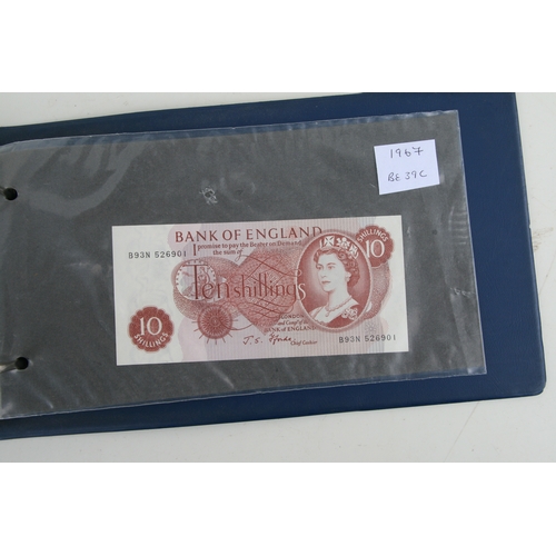 429 - An album containing English banknotes to include 10 shilling note, £1 notes and £5 notes, some in un... 