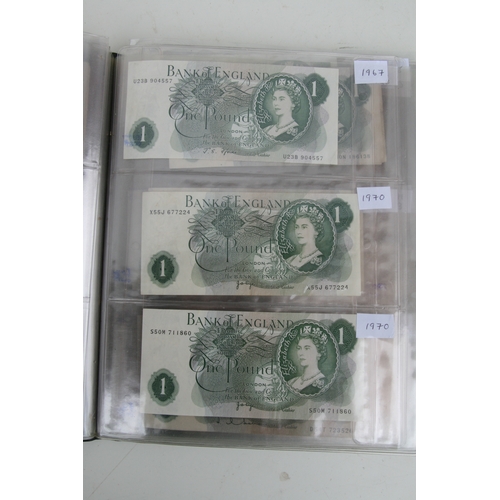 430 - A quantity of English banknotes to include 10 shilling and £1 notes,  many uncirculated with consecu... 