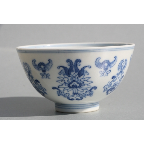 513 - A Chinese blue & white footed bowl decorated with stylised flowers, six character blue mark to t... 