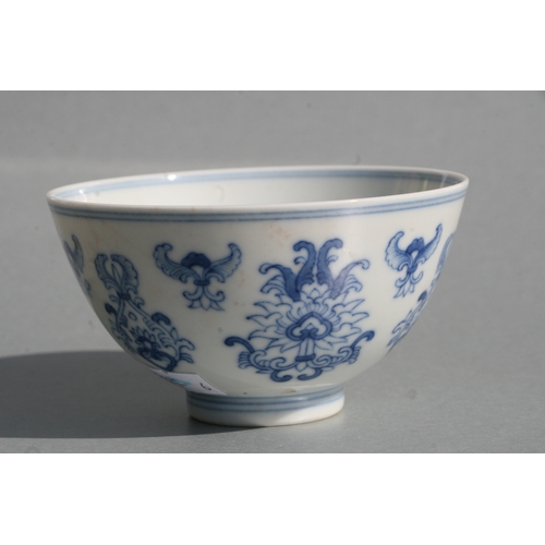 513 - A Chinese blue & white footed bowl decorated with stylised flowers, six character blue mark to t... 